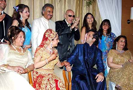 The entire family gets together to bless the newly weds